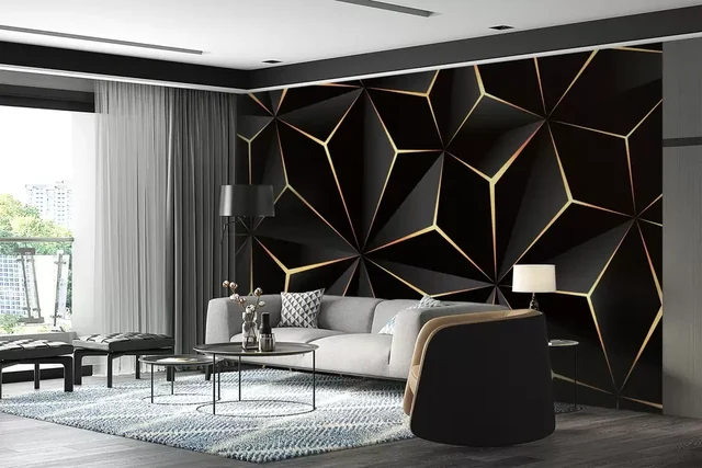 Geometric black-and-gold wallpaper on a living room feature wall